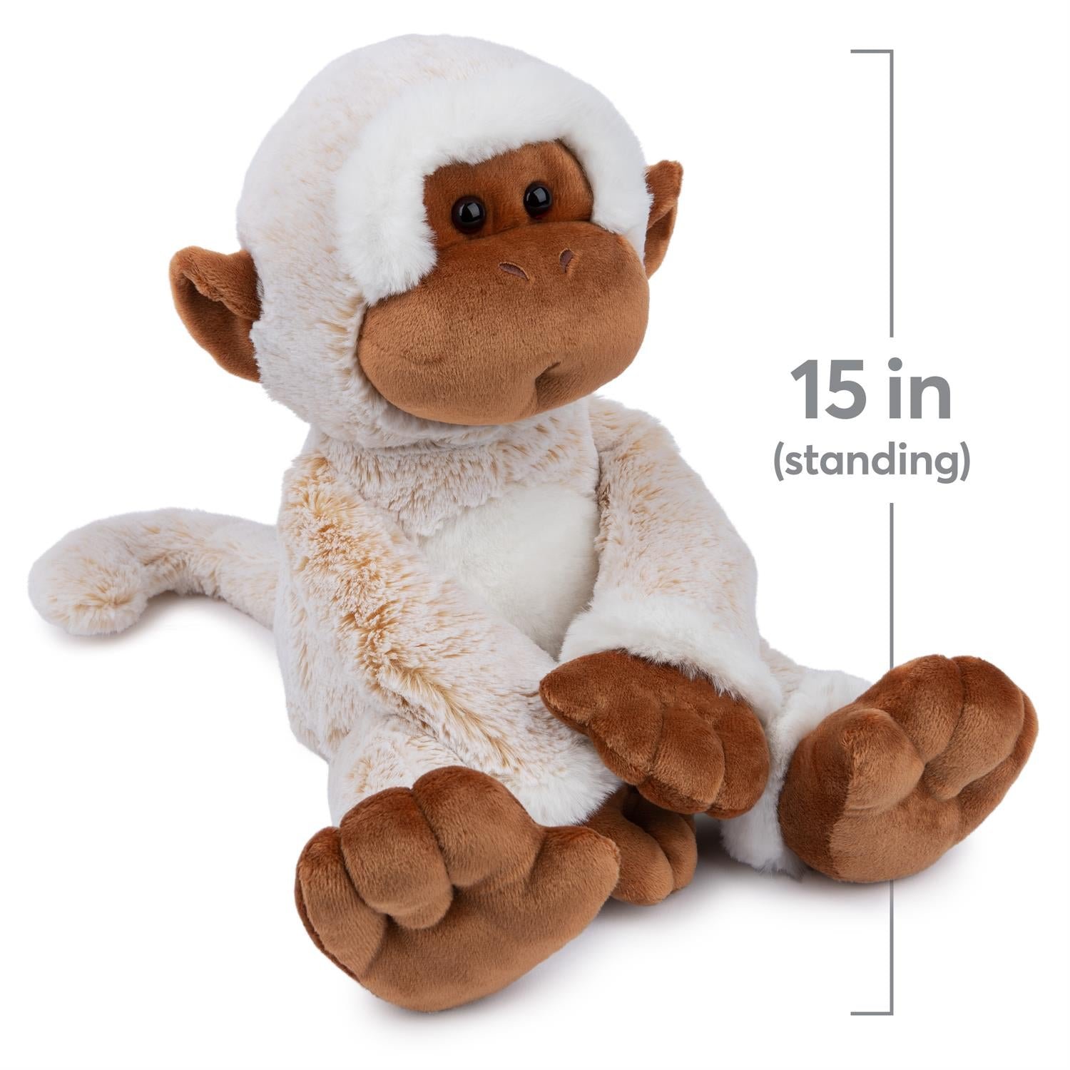 Plush monkey toy with measurements on a white background
