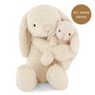 Two cream-colored plush bunnies.